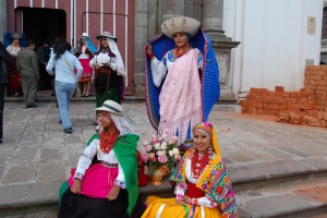 Local women in bright colored clothing in Ecuador.