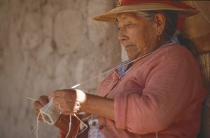 A chilean woman knitting.